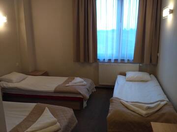 Фото номера Трехместный номер Отель Hotel Nowostawy г. Nowostawy Dolne 3
